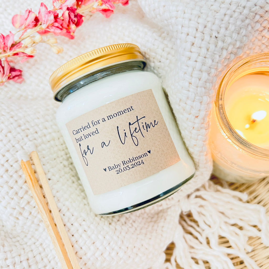 Baby loss Personalised Candle Gift. A scented soy wax candle on a soft fluffy background.