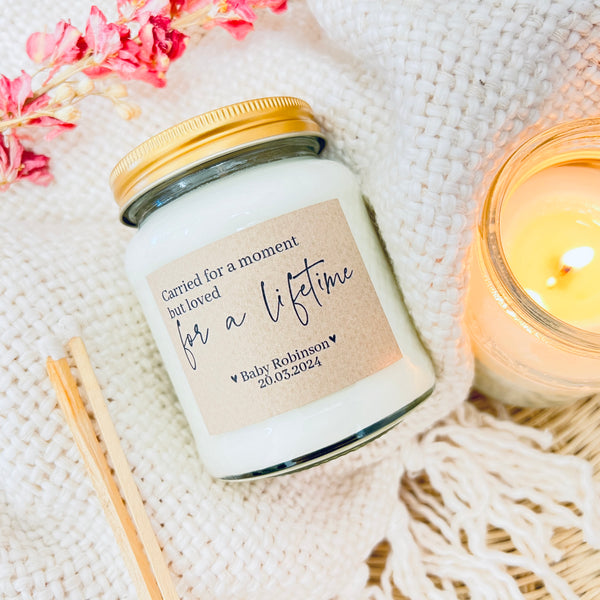 Baby loss Personalised Candle Gift. A scented soy wax candle on a soft fluffy background.