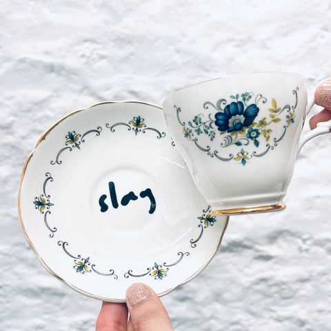 Vintage Teacup & Saucer Set with Hidden 'Slag' Reveal